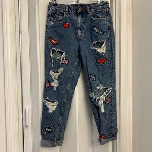 Ripped jeans with patches